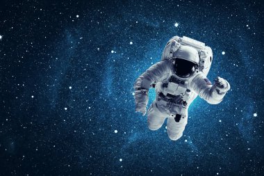 Uzayda bir astronot. Bu görüntünün elementleri NASA tarafından desteklenmektedir