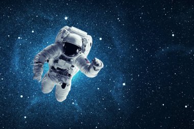 Uzayda bir astronot. Bu görüntünün elementleri NASA tarafından desteklenmektedir