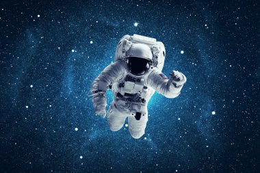 Astronaut in outer space. Elements of this image furnished by NASA clipart