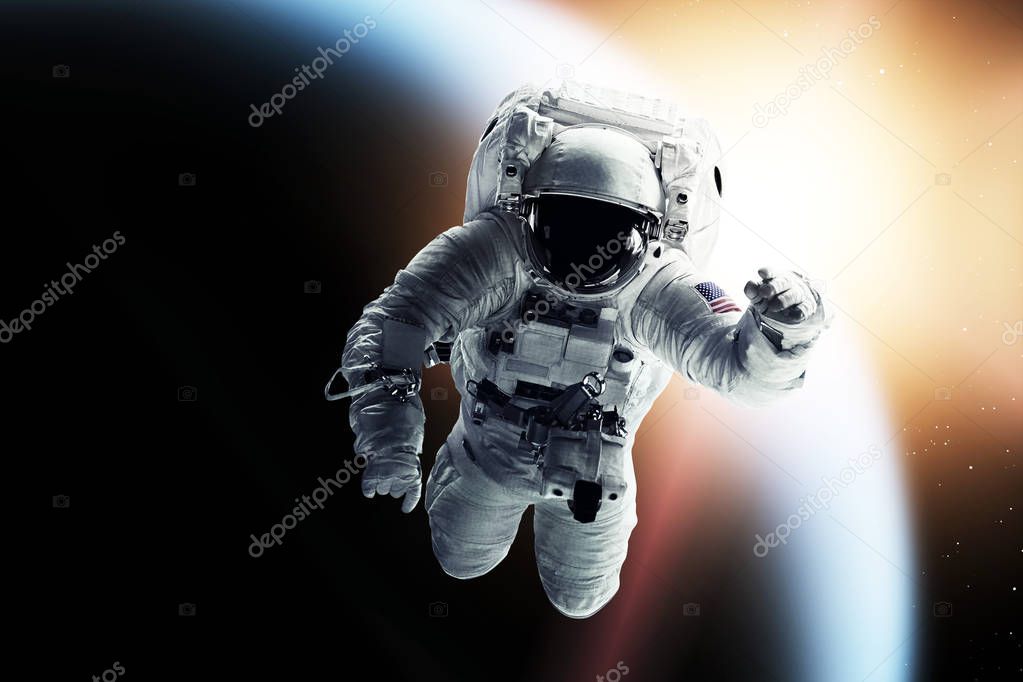 Astronaut in outer space. Elements of this image furnished by NASA