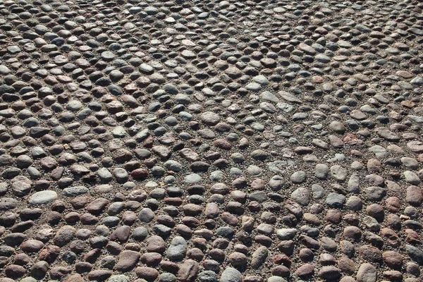 斯德哥尔摩花岗岩鹅卵石背景图案 格姆拉斯坦的鹅卵石广场 — 图库照片