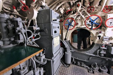 LABOE, GERMANY - AUGUST 30, 2014: Interior of German submarine U-995 (museum ship) in Laboe. It is the only surviving Type VII submarine in the world. It was launched in 1943. clipart