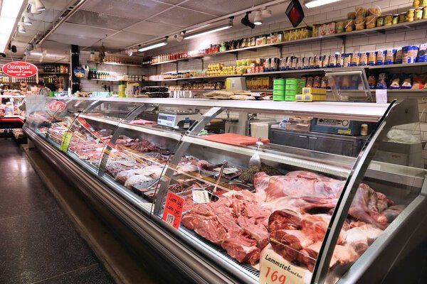 STOCKHOLM, SWEDEN - AUGUST 23, 2018: Meat store at Hotorgshallen Saluhall market in Stockholm. It is one of biggest food marketplaces in Sweden.