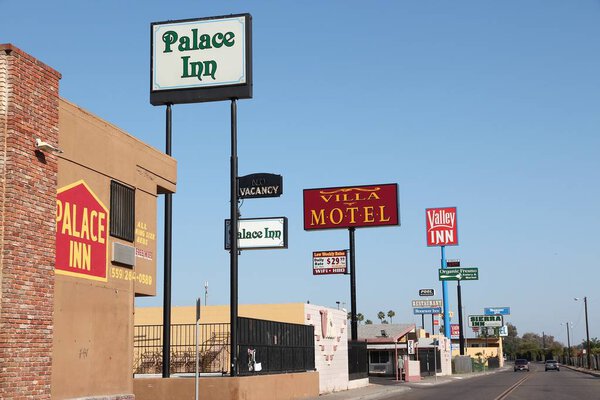 FRESNO, UNITED STATES - APRIL 12, 2014: Motel row in Fresno, California. There are about 150 motels in Fresno, the 5th largest city in California.