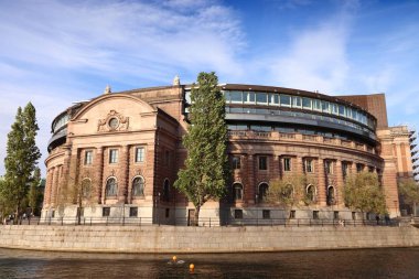 Riksdag (Parliament of Sweden) building in Stockholm. Sunset light. clipart