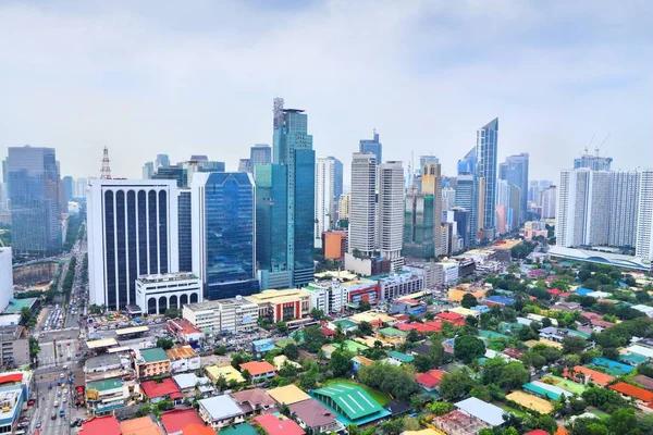 Makati city skyline in Manila, Philippines. Office buildings.