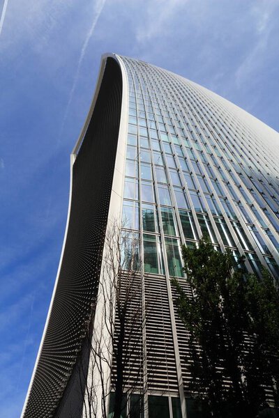 LONDON, UK - JULY 6, 2016: 20 Fenchurch Street skyscraper in London, UK. The postmodern style office building was designed by Rafael Vinoly. It is nicknamed Walkie Talkie.
