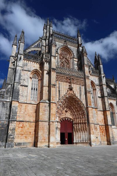 Portugal landmark. Batalha Monastery. Medieval gothic church in Portugal. UNESCO World Heritage Site.