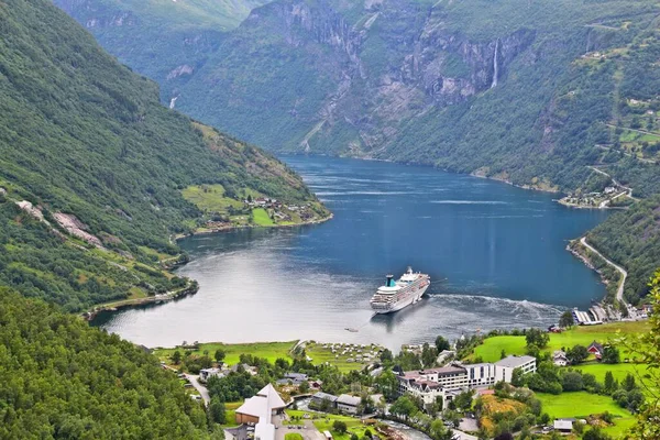 Geiranger Fiord in Norway. Cruise ship in harbor.