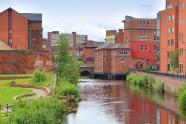 Sheffield - city in South Yorkshire, UK. River Don and old factories. clipart