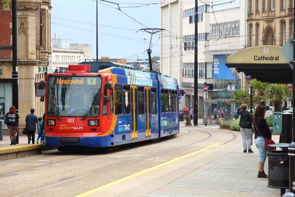 SHEFFIELD, UK - JULY 10, 2016: People ride Stagecoach Supertram in Sheffield, Yorkshire, UK. Sheffield Supertram served 11.6 million annual rides in 2015/16.