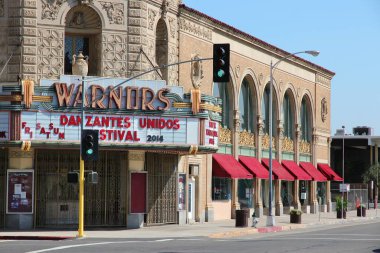 FRESNO, UNITED STATES - APRIL 12, 2014: Warnors Theatre in Fresno, California. The building was completed in 1928 and is on US National Register of Historic Places. clipart