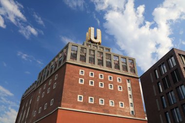 DORTMUND, GERMANY - SEPTEMBER 16, 2020: Dortmunder U (U-Turm), a former brewery building converted to museum and centre for the arts. Dortmund is the largest city in Ruhr area of Germany. clipart