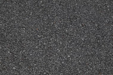 Yol yüzeyi arka planı. Asfalt koyu gri asfalt yol dokusu.