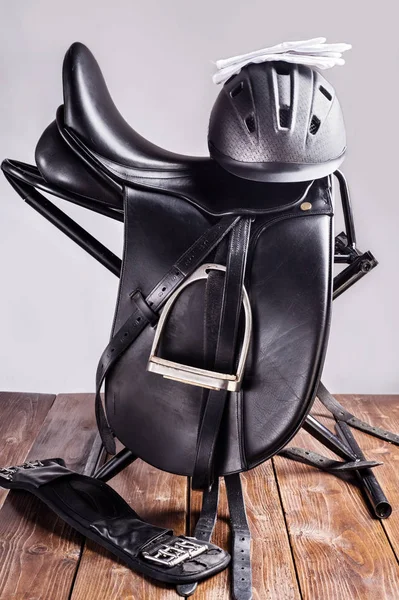 Black professional  leather dressage saddle in complete with rid — Stock Photo, Image