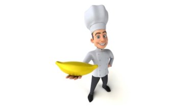 Eğlenceli şef elinde muz tutuyor.