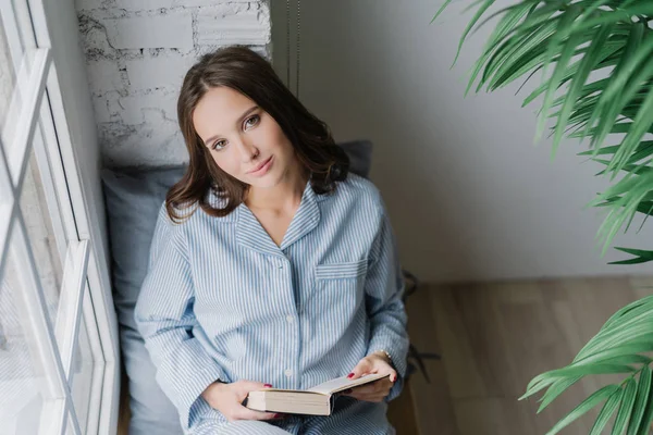 Top View Relaxed Pleasant Looking Woman Enjoys Reading Book Dressed — Stock Photo, Image