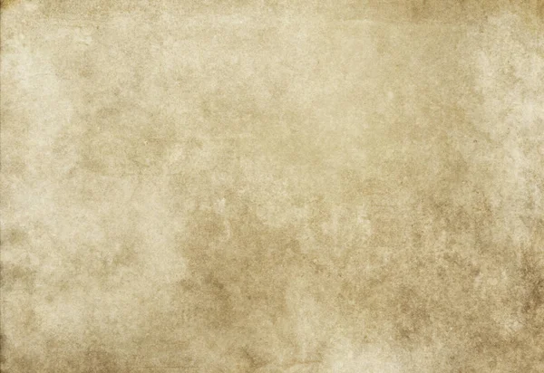 Old yellowed and grunge paper background. Natural condition old paper texture.