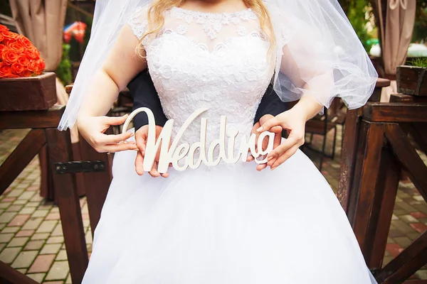 Wedding bride holding a sign vintage color — Stock Photo, Image