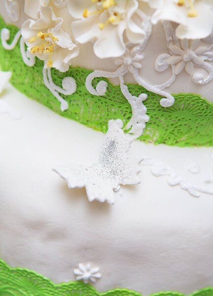 Wedding loaf. A tall beautiful loaf decorated with flowers, designed for a holiday, close-up