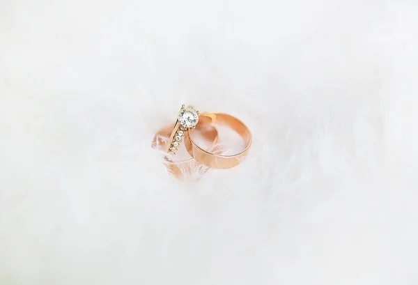 Beautiful wedding rings on a white — Stock Photo, Image