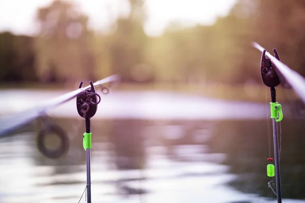 Fishing Poles Lake Shore Sunset — Stock Photo, Image