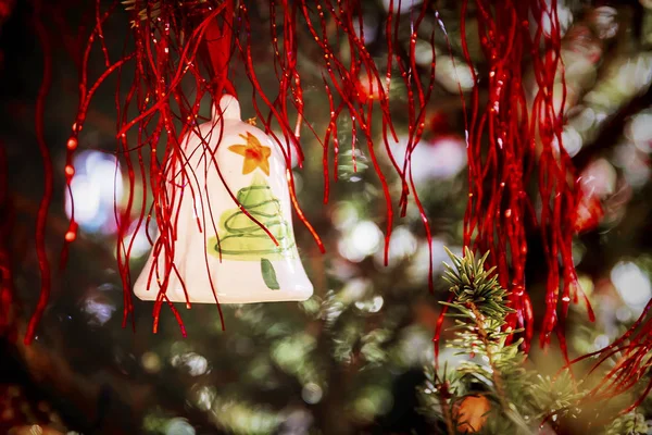 Decorative bell on the christmas tree — Stock Photo, Image