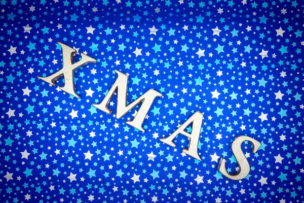 Χριστούγεννα λέξη κατασκευασμένα από ξύλινα γράμματα — Φωτογραφία Αρχείου
