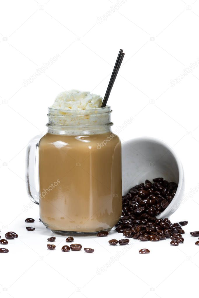 fresh brewed coffee served with irish cream then topped with whipped cream isolated on a white background