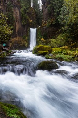 Carved from ancient columnar basalt the falls drop approximately 120 feet. Photo taken on a cloudy day late October with some golden seasonal highlights clipart