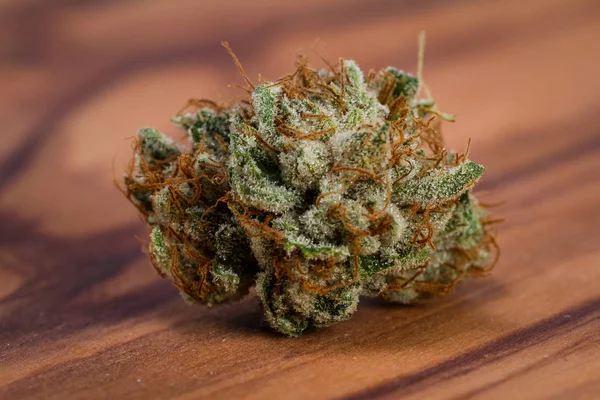 Cannabis bud on a table — Stock Photo, Image