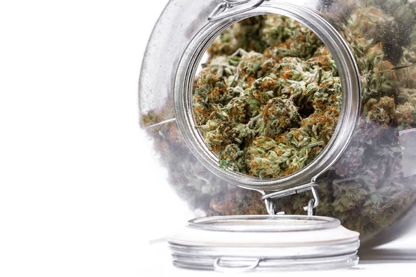Glass jar full of cannabis — Stock Photo, Image