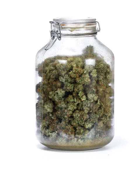 Frasco de vidro cheio de cannabis — Fotografia de Stock