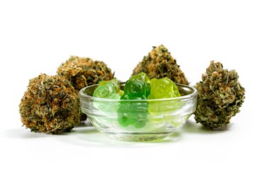 marijuana edibles over white  clipart