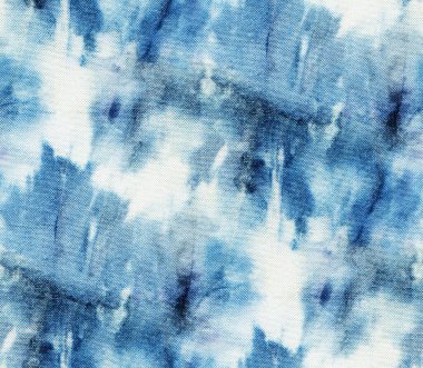 Beyaz ipeğin üzerindeki çivit rengi kusursuz kravat boyası deseni. El boyası kumaşlar - nodüler batik. Shibori boyaması.. 