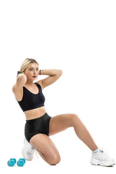 Portret fitness vrouw. geïsoleerd op witte achtergrond — Stockfoto
