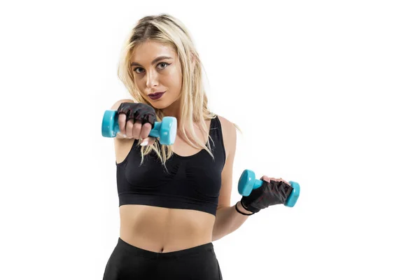 Hermosa mujer en forma haciendo ejercicio con pesas —  Fotos de Stock