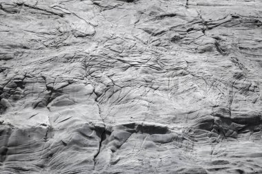 Eski lav arka plan - Gran Canaria, sahil Arucas kuzeyinde birçok düzgün kıvrımları ile volkanik kökenli rock