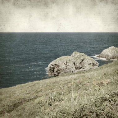 Asturias, İspanya kıyı manzara ile eski Kağıt arka plan dokulu