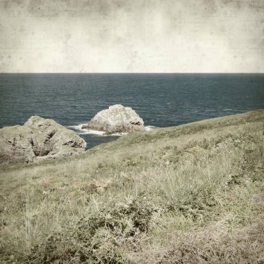 Asturias, İspanya kıyı manzara ile eski Kağıt arka plan dokulu