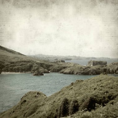 Asturias, İspanya kıyı manzara ile eski Kağıt arka plan dokulu