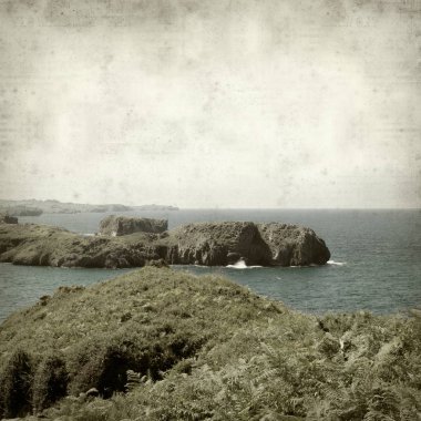 Asturias, İspanya kıyı manzara ile eski Kağıt arka plan dokulu