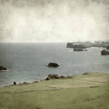 Asturias, İspanya kıyı manzara ile eski Kağıt arka plan dokulu