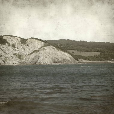 Bask Ülkesi kıyı manzara ile dokulu eski Kağıt arka plan  