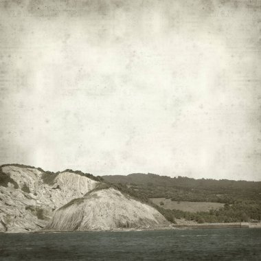 Bask Ülkesi kıyı manzara ile dokulu eski Kağıt arka plan  