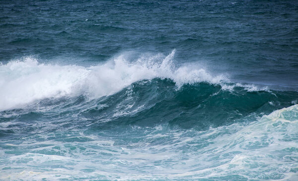 powerful ocean waves breaking by the shores of Gran Canaria