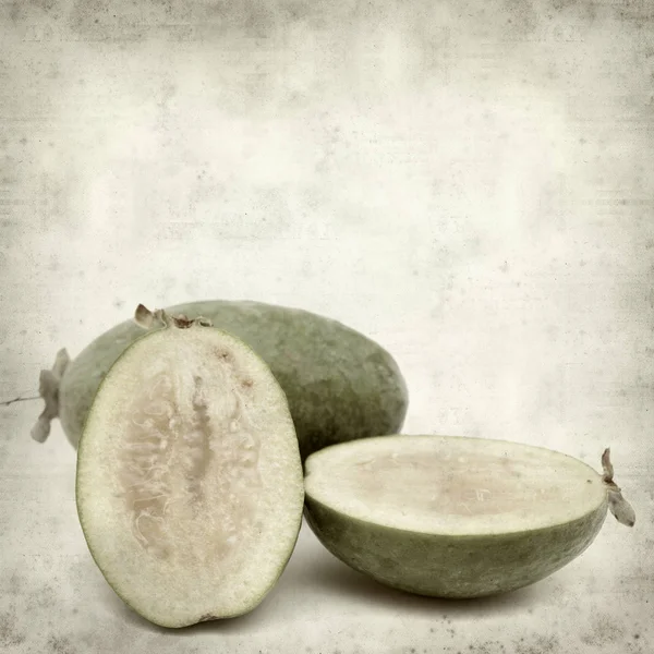 Gestructureerde Oud Papier Achtergrond Met Groene Feijoa Fruit — Stockfoto