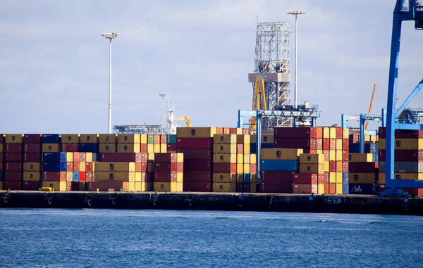 LAS PALMAS, SPAIN - NOVEMBER 30:  Cargo containers are handled in busy cargo terminal on November 30, 2018 in Las Palmas de Gran Canaria, Spain