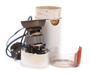 broken electric coffee mill with the the plastic body gone clipart