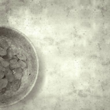 şık eski Kağıt arka plan, kare, sarışın kuru üzüm küçük kase ile dokulu